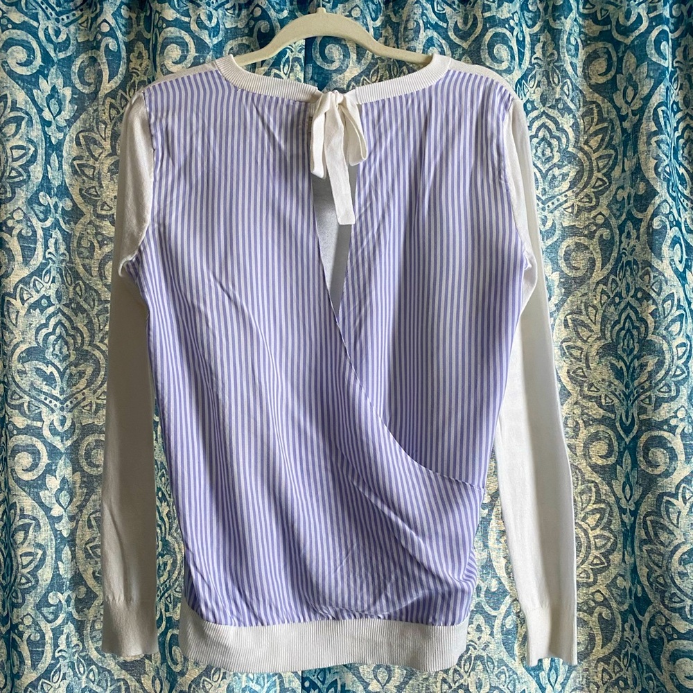 Brand new with tags attached loft sweater with a fun open back. XSM